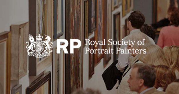 People looking at portraits at the Royal Society of Portrait Painters exhibition at Mall Galleries